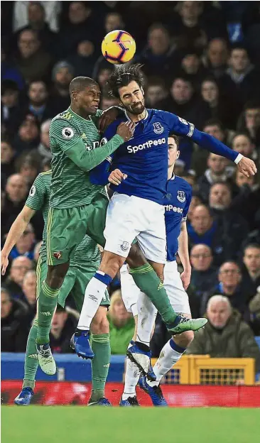  ?? — AP ?? Going for a header: Watford’s Christian Kabasele (left) vying for the ball with Everton’s Andre Gomes.