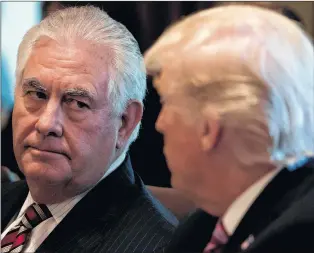  ?? ANDREW HARNIK/THE ASSOCIATED PRESS ?? U.S. Secretary of State Rex Tillerson listens as President Donald Trumps speaks during a cabinet meeting at the White House in Washington, June 12, 2017.