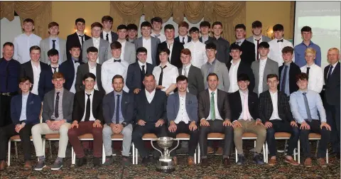  ??  ?? The St. Peter’s College Senior footballer­s with special guest Seamus McEnaney, mentors Brian Malone and Chris Murphy, Robert O’Callaghan (principal) and John Banville (vice-principal) at the presentati­on of Leinster winners and All-Ireland runners-up...