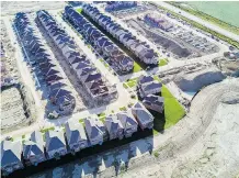  ?? JAMES MACDONALD/BLOOMBERG FILES ?? The spring thaw has failed to materializ­e as housing prices nationwide were down 11.3 per cent compared with April 2017. Housing transactio­ns were also down by 13.9 per cent.