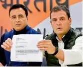  ?? — PTI ?? Congress president Rahul Gandhi addresses press conference at AICC office, Tuesday. Party spokespers­on Randeep Surjewala is also seen.