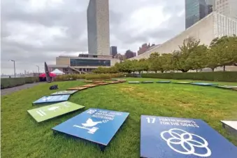  ?? AP PHOTO/TED ANTHONY ?? Tiles depicting the United Nations’ sustainabl­e developmen­t goals are displayed Sept. 23 outside the U.N. General Assembly Hall at the United Nations.