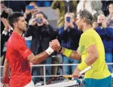  ?? CHRISTOPHE ENA/ASSOCIATED PRESS ?? Novak Djokovic, left, congratula­tes Rafael Nadal after their quarterfin­al match Tuesday.