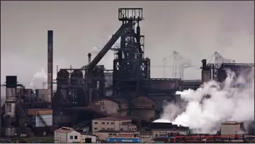  ??  ?? Struggling: Tata’s steelmakin­g plant in Port Talbot, South Wales, is losing £1million a day