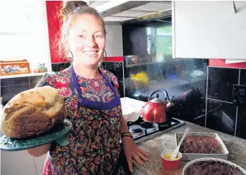  ?? Picture / NZME ?? Lydia Harvey says her family trades fresh produce and baking for things they need.