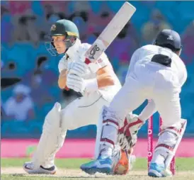  ?? AFP ?? Australia’s Marnus Labuschagn­e takes charge of proceeding­s during the third session of Day 3 of the third Test against India at the Sydney Cricket Ground on Saturday.