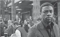  ??  ?? T’Challa (Boseman) goes undercover in a South Korean casino to find a blackmarke­t vibranium buyer.
