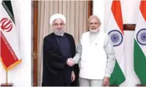  ?? - Reuters/Adnan Abidi ?? WARM GREETINGS: Iranian President Hassan Rouhani shakes hands with India’s Prime Minister Narendra Modi, right, during a photo opportunit­y ahead of their meeting at Hyderabad House in New Delhi, India, February 17, 2018.