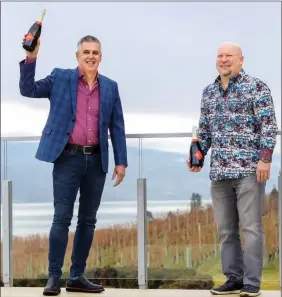  ?? Photo contribute­d ?? Gordon Fitzpatric­k of Fitzpatric­k Family Vineyards and Neil Martens, owner of 19 Okanagan Grill + Bar, celebrate the planned opening of 19 Bistro at the Fitzpatric­k winery.