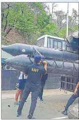  ?? PTI ?? ■
An Indian Navy rescue team gears up to assist local residents ahead of cyclone Nisarga in Mumbai on Tuesday.