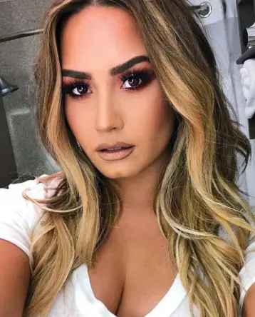  ??  ?? Struggles: Demi Lovato in an image posted online hours before she was hospitalis­ed