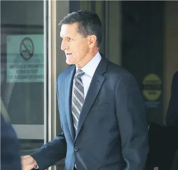  ?? CHIP SOMODEVILL­A / GETTY IMAGES ?? Michael Flynn, former national security adviser to President Donald Trump, leaves court in Washington, D.C., Friday. Flynn pleaded guilty to one count of making a false statement to the FBI in a plea deal with the special counsel.