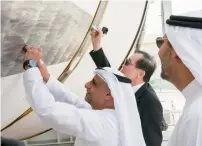  ??  ?? Jassim Mohammed Al Zaabi, Khaldoon Al Mubarak and Ahn Choong-yong during the ceremony of signing the steam generator.