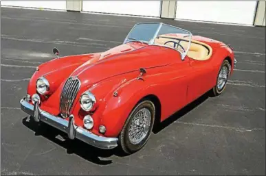  ?? PHOTO PROVIDED ?? The late Dennis Dammerman’s entire collection of 43 cars including a 1957 Jaguar XK 140M will highlight this year’s Saratoga Auto Auction.