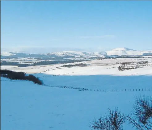  ??  ?? Morven (on the right) divides the rolling countrysid­e of Lower Deeside to the east from the more dramatic Cairngorms to the west