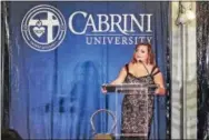  ??  ?? Alumna Candice Linehan (‘03) speaks after receiving the Compass Award in recognitio­n of her steadfast dedication to protecting the life and dignity of all people