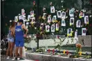  ?? Photograph: Andrea Sarcos/AFP/Getty Images ?? A makeshift memorial at the site of the collapsed building in Surfside.