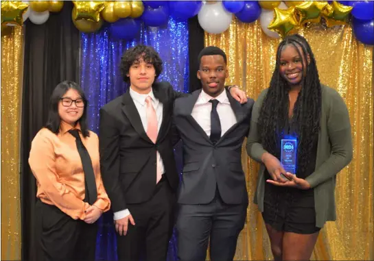  ?? PETER CURRIER — LOWELL SUN ?? From left: Boys & Girls Club of Greater Lowell 2024Youth of the Year finalists Alix Huynh, 17, Jayden Stella, 16, Isaiah Mwesige, 17, and winner Maureen Onyeneho, 17, at the award ceremony March 21, 2024at Lenzi’s Catering and Function Facility in Dracut.