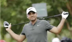  ??  ?? CHARLOTTE: Jason Day of Australia, warms up on the 11th hole during the second round of the PGA Championsh­ip golf tournament at the Quail Hollow Club Friday, in Charlotte. —