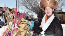  ?? JOGOD / XINHUA ?? Cherma boxes and traditiona­l snacks top the shopping list of New Year goods in Tibet.