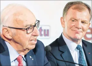  ?? GRAHAM HUGHES/THE CANADIAN PRESS ?? Group Jean Coutu Chairman Jean Coutu speaks as Metro Inc. president and CEO Eric La Fleche looks on during a news conference in Montreal on Monday.