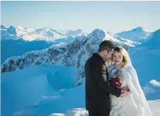  ?? WHISTLER TOURISM ?? A mountainto­p ceremony surrounded by snow-capped peaks is a romantic option that can be arranged in Whistler, B.C.