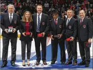  ?? BRUCE BENNETT / GETTY IMAGES ?? Hall of Fame inductees (from left) Aleksander Yakushev, Jayna Hefford, Martin Brodeur, Willie O’Ree, Martin St. Louis and Gary Bettman are introduced prior to the 2018 Hockey Hall of Fame Legends Classic Game on Sunday in Toronto.