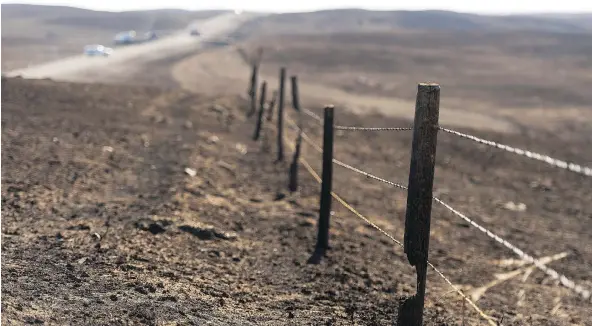  ?? PHOTOS: MICHAEL BELL/FILES ?? The Agricultur­al Producers Associatio­n of Saskatchew­an wants government funding to repair private fences damaged in a wildfire in the southwest last month.