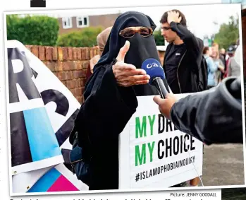  ?? Picture: JENNY GOODALL ?? Protest: A woman outside Mr Johnson’s Uxbridge office yesterday