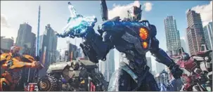  ?? PHOTOS PROVIDED TO CHINA DAILY ?? The new sci-fi film, Pacific Rim Uprising, about a new generation of Jaeger pilots who fight alien invaders from the deep sea, will hit Chinese cinemas on Friday.