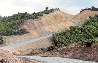  ?? ?? Reserve Rd is being upgraded to enable turbine blades and towers to be brought in for the southern section of Mercury’s Turitea wind farm.