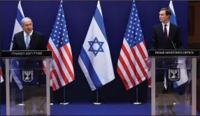  ?? (AP/Debbie Hill) ?? Israeli Prime Minister Benjamin Netanyahu (left) and White House adviser Jared Kushner discuss the Israeli-United Arab Emirates peace agreement Sunday in Jerusalem.