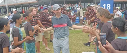  ?? Photo: Waisea Nasokia ?? Volunteers congratula­te 2017 Fiji Internatio­nal champion Jason Norris at the Natadola Bay Championsh­ip Golf Course club house on August 20, 2017.