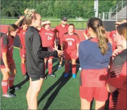  ?? Peter Wallace / For Hearst Connecticu­t Media ?? Becca Pope, in her third year as Wamogo’s girls soccer coach, stresses fundamenta­ls for the young team she brought to a scrimmage with Torrington at the Robert H. Frost Sports Complex Thursday afternoon.