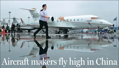  ?? GAO ERQIANG / CHINA DAILY ?? A business jet, made by Bombardier Inc, is on display at the Asian Business Aviation Conference and Exhibition in Shanghai, which opens on Tuesday.