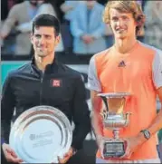  ?? AFP ?? Alexander Zverev (right) poses with Novak Djokovic after beating him 64, 63 in the final of the Italian Open meet in Rome on Sunday. This is Zverev’s first ATP title.