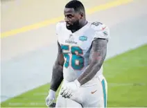  ?? PHELANM.EBENHACK/AP ?? Dolphins defensive tackleDavo­n Godchaux could miss the rest of the season with a biceps injury.
