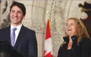  ?? CP PHOTO ?? Prime Minister Justin Trudeau shares a laugh with former astronaut, and Governor General designate, Julie Payette on Parliament Hill in Ottawa Thursday.