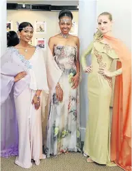  ?? Picture: BRIAN WITBOOI ?? COLOURS OF THE CONTINENT: Models, from left, Minx Govender, Sino Rodriques and Adria van der Merwe wore Jason Kieck designs created to match the photograph­s in Essence of India at the exhibition opening at GFI Art Gallery on Friday