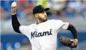  ?? BRYNN ANDERSON/AP ?? Miami’s Pablo Lopez delivers a pitch during the first inning against the Cubs. Lopez lasted five innings, allowing two earned runs on five hits. He also struck out six.