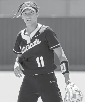  ?? CHRIS LANDSBERGE­R/THE OKLAHOMAN ?? Junior shortstop Tallen Edwards and Southmoore are the defending Class 6A state fastpitch softball champions.