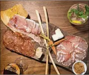  ?? CONTRIBUTE­D BY MIA YAKEL ?? Ecco Buckhead’s Cured Meats and Cheeses plate is a signature item from the original Ecco in Midtown.