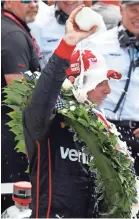  ?? BRIAN SPURLOCK/USA TODAY SPORTS ?? Will Power celebrates with milk after winning the Indianapol­is 500 at Indianapol­is Motor Speedway on Sunday.