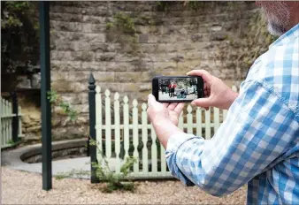  ?? COURTESY PHOTO ?? Mackenzie Doss worked with Edward C. Robison III on an augmented reality project for this year’s May Festival of the Arts in Eureka Springs. Using a smart phone camera, visitors can see scenes from “The Tempest” in various locations around town.