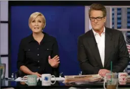  ?? CAROLYN COLE, TNS ?? Mika Brzezinsk, left, and Joe Scarboroug­h, of MSNBC’s “Morning Joe.” Breaking normal journalism impartiali­ty, Scarboroug­h writes he thinks Trump should be removed from office.
