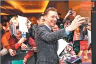  ??  ?? Hiddleston meets fans in Beijing to promote the upcoming fantasy adventure.