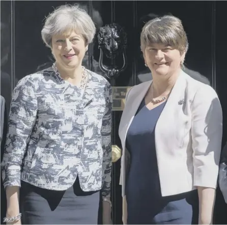  ?? PICTURE: GETTY ?? 0 Theresa May’s government alliance with Arlene Foster and the DUP has already angered many