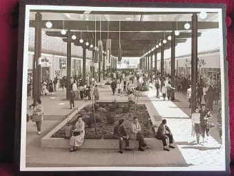  ?? COURTESY OF WINROCK ?? This undated photo shows crowds inside Winrock after its 1961 opening but before its 1975 enclosure.