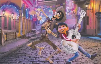  ??  ?? Hector, voiced by Gael Garcia Bernal, left, and Miguel, voiced by Anthony Gonzalez in Coco.