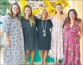  ?? ?? FAMILY: Concierge Service for Students founder Tammy Kumin (center) and fellow rent-a-moms Alicia Stedman (l.-r.), Kate Morreale, Sarah Janes and Mandy Zobel help homesick students with everything from laundry to bail money to meals.